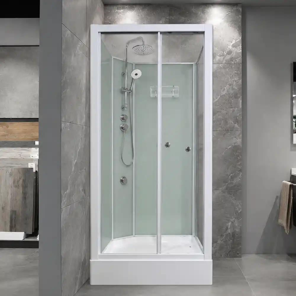 3000 Corner Shower Cubicle displayed in a premium bathroom showroom featuring a fully enclosed watertight corner shower with sliding glass doors and chrome rainfall shower fittings.