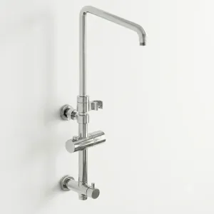 Polished chrome adjustable rainfall shower arm mounted on a white wall for enclosed cubicles.